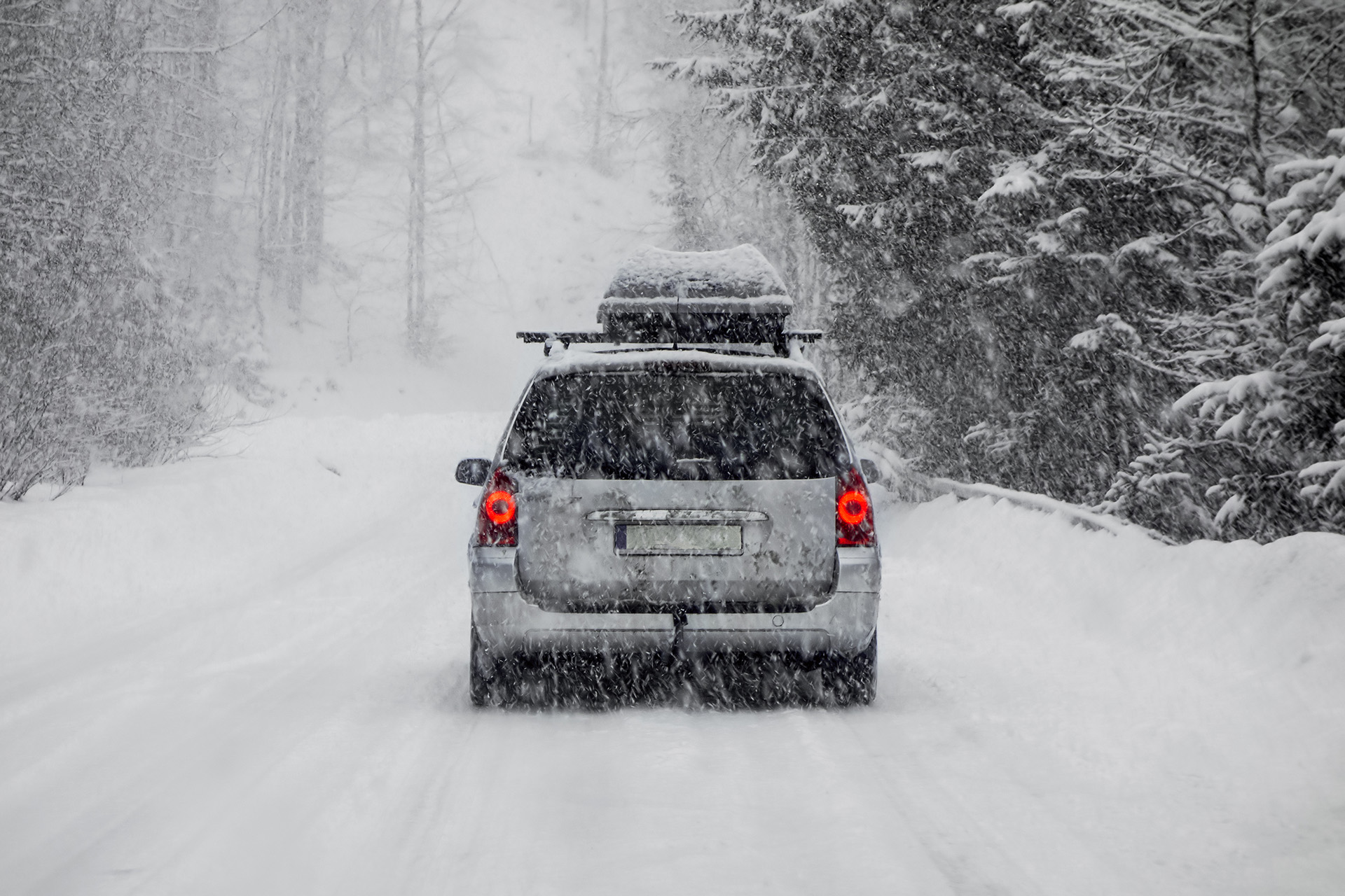 Vehicle License Plate Obscured By Snow